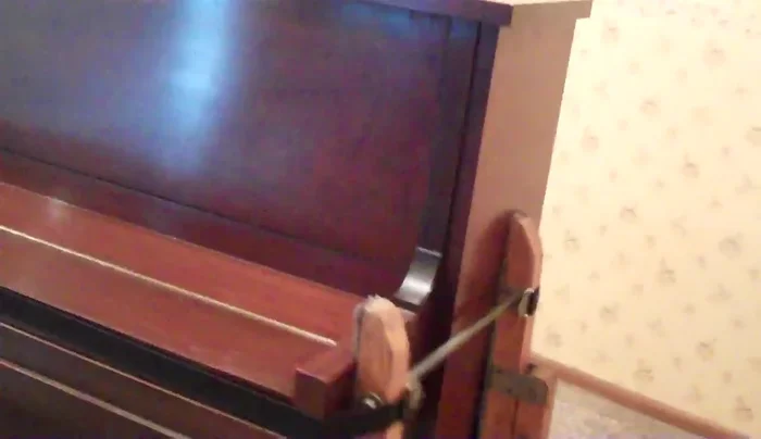 Lower the wheels and move the piano to its new location.