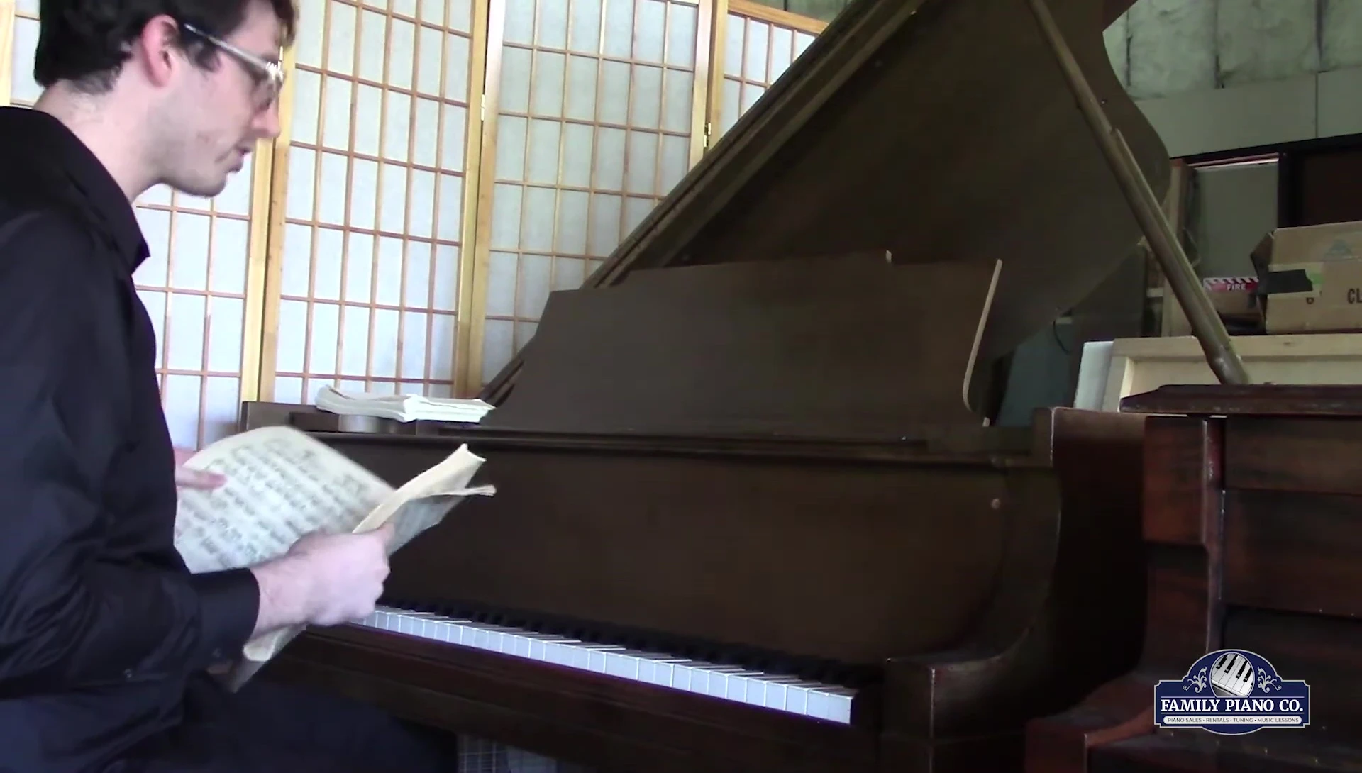 Pianist performing a Mozart piece, showing the piano's ability to handle harmonic playing.
