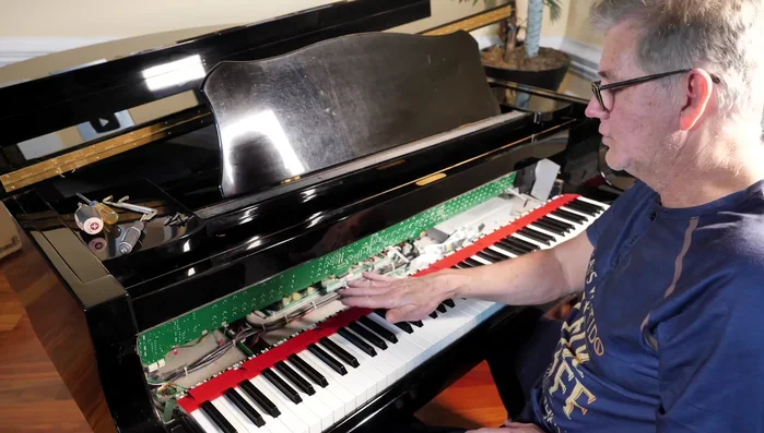 Remove the keyboard from the piano. There may be ribbon cables connecting the keyboard to the electronics. 