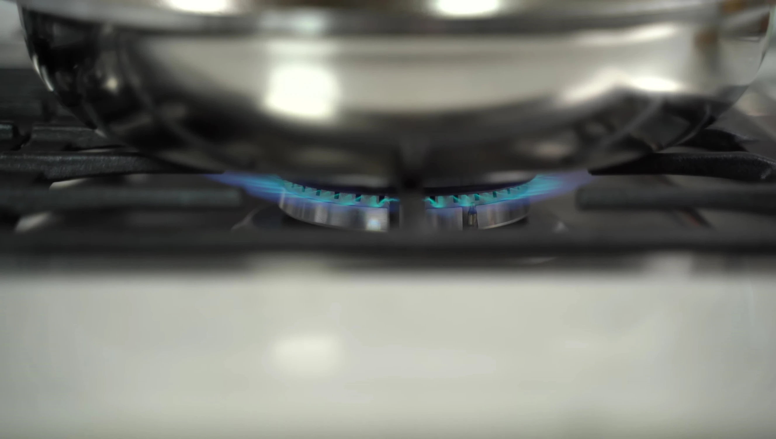 The water droplet test being performed on the heated pan